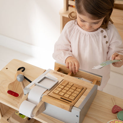 Spielkasse mit Kind