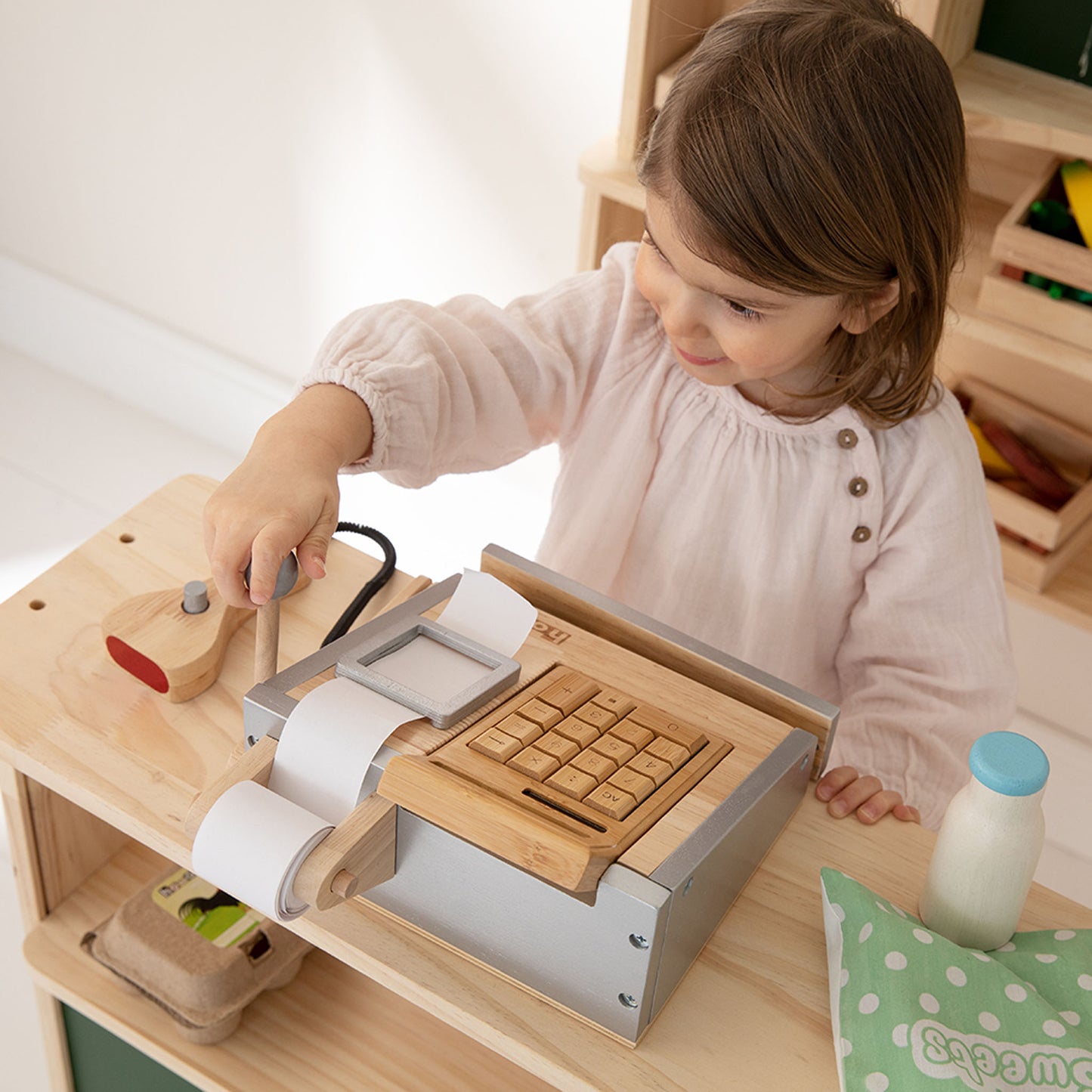 Spielkasse mit Kind