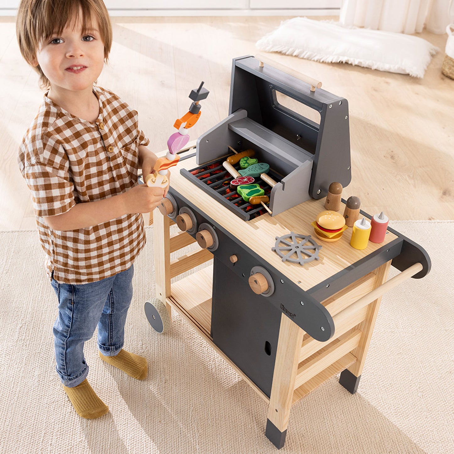 Kindergrill mit Kind