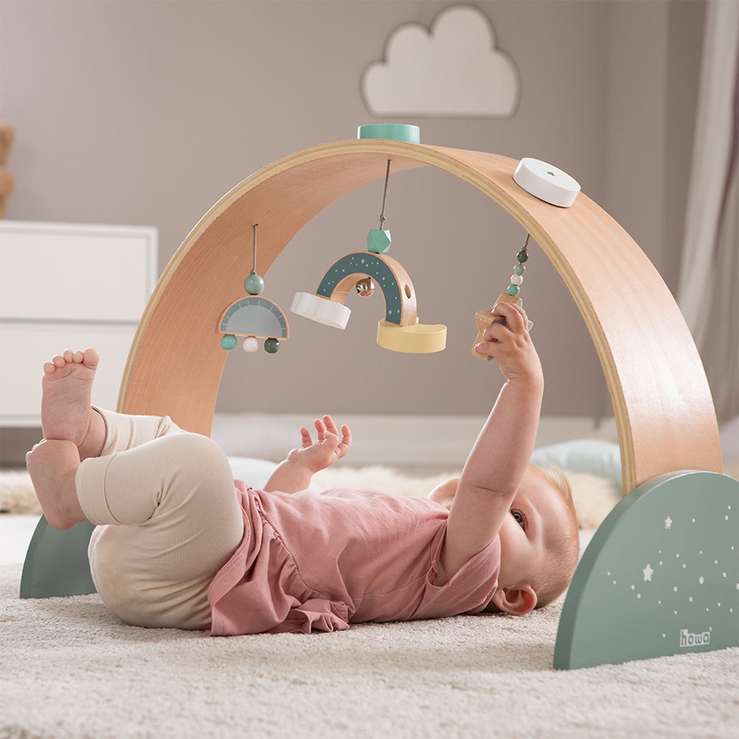 Spielbogen mit Baby