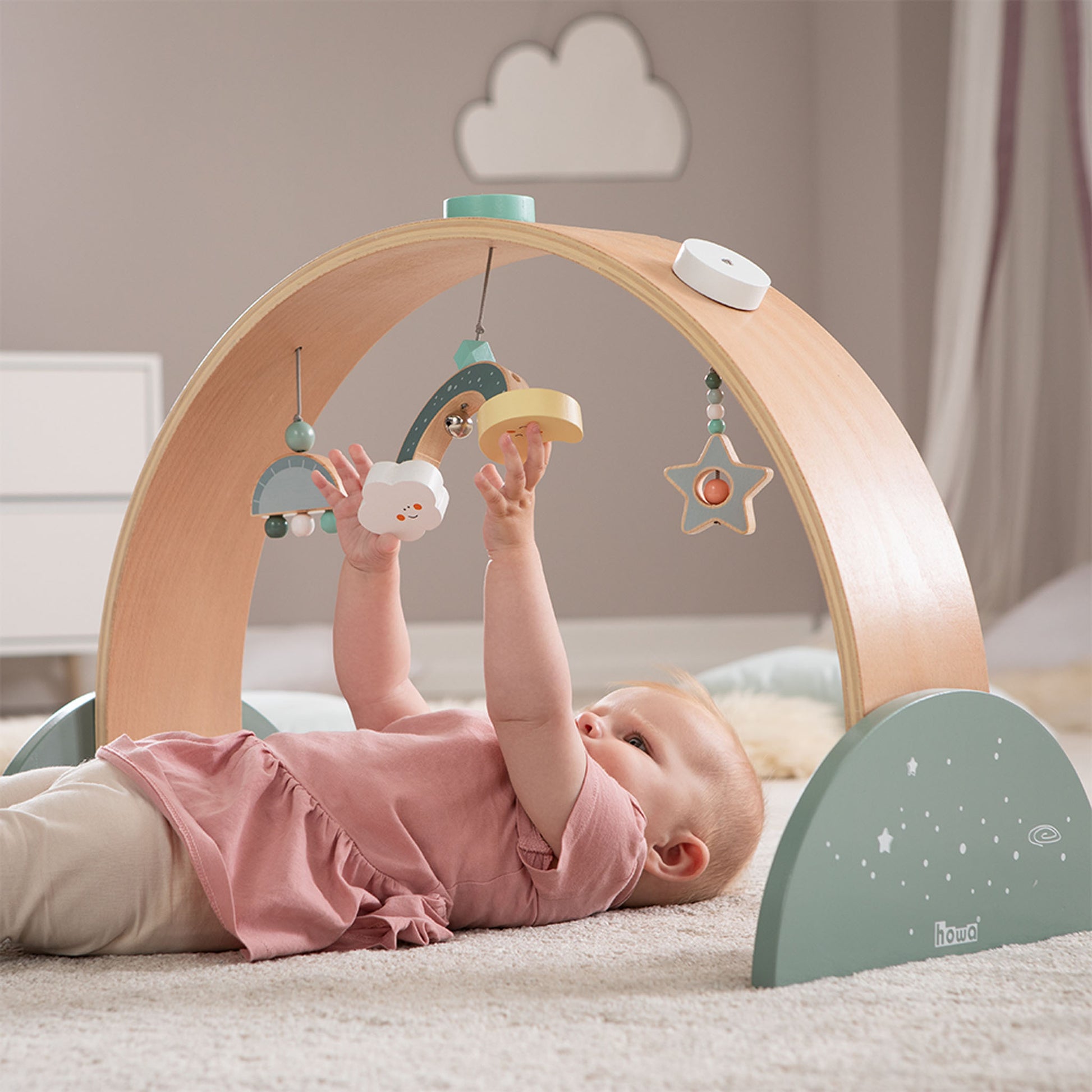 Spielbogen mit Baby